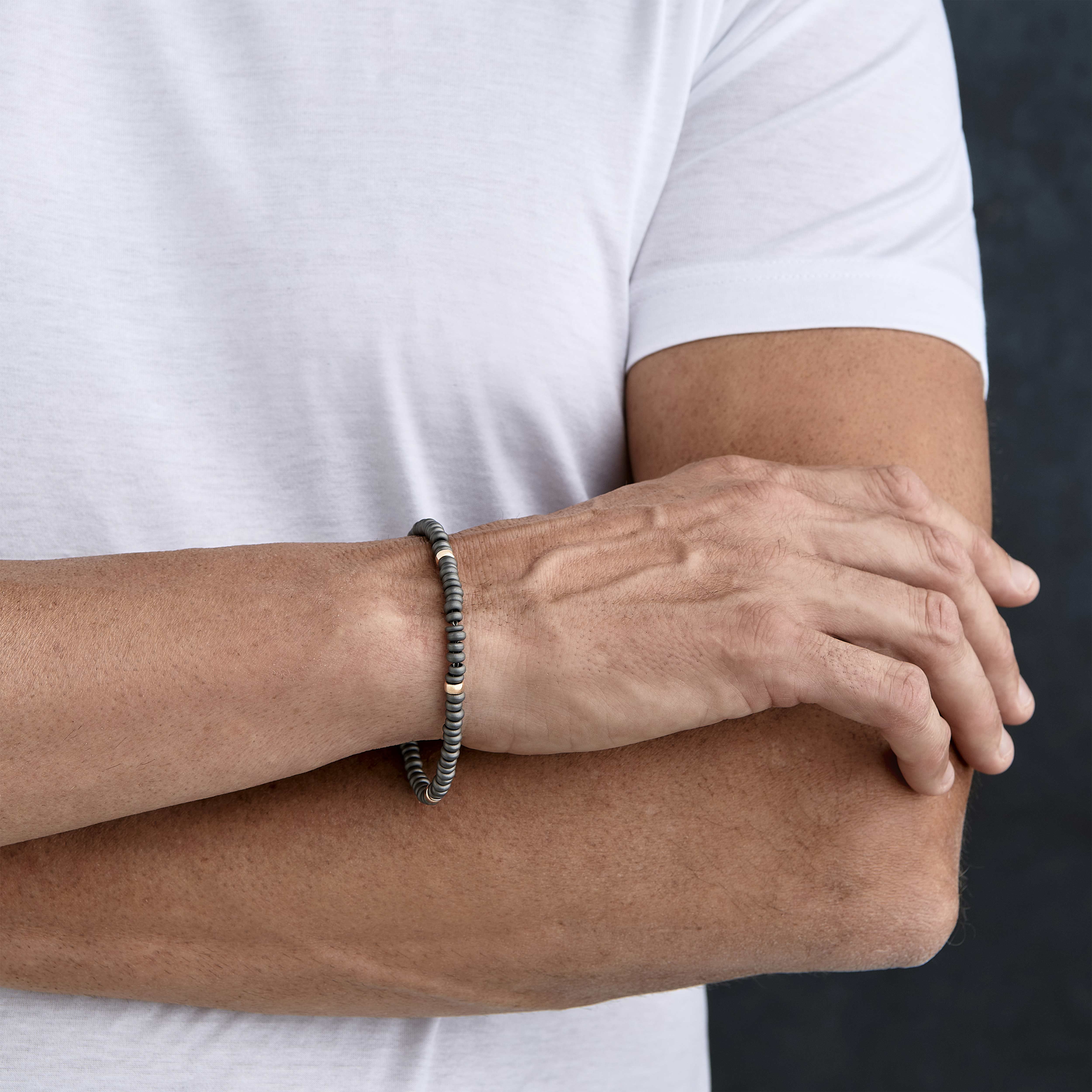 BRACCIALE UOMO CON ANELLINI IN TITANIO E ORO ROSSO 9 KT