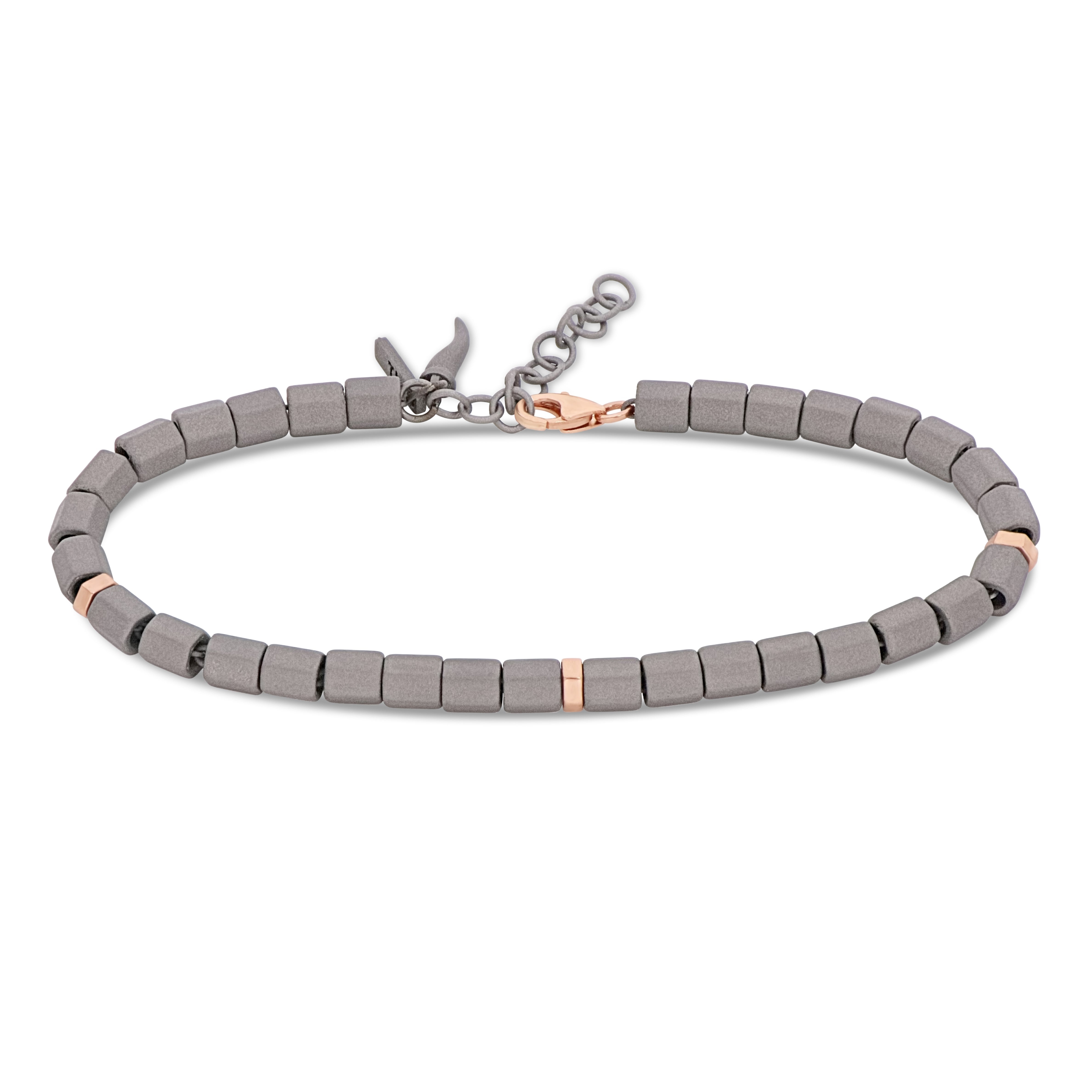 BRACCIALE UOMO CON ESAGONINI IN TITANIO, TRE ESAGONI SOTTILI IN ORO ROSSO 9 KT