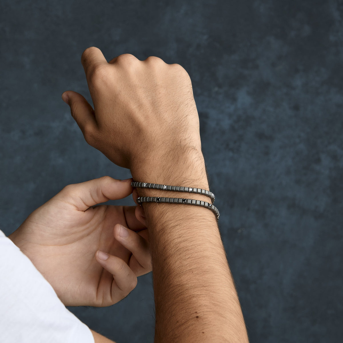 BRACCIALE TENNIS CLASSICO IN TITANIO, ORO ROSSO 18 KT E 10 DIAMANTI BLACK DA 5 PUNTI