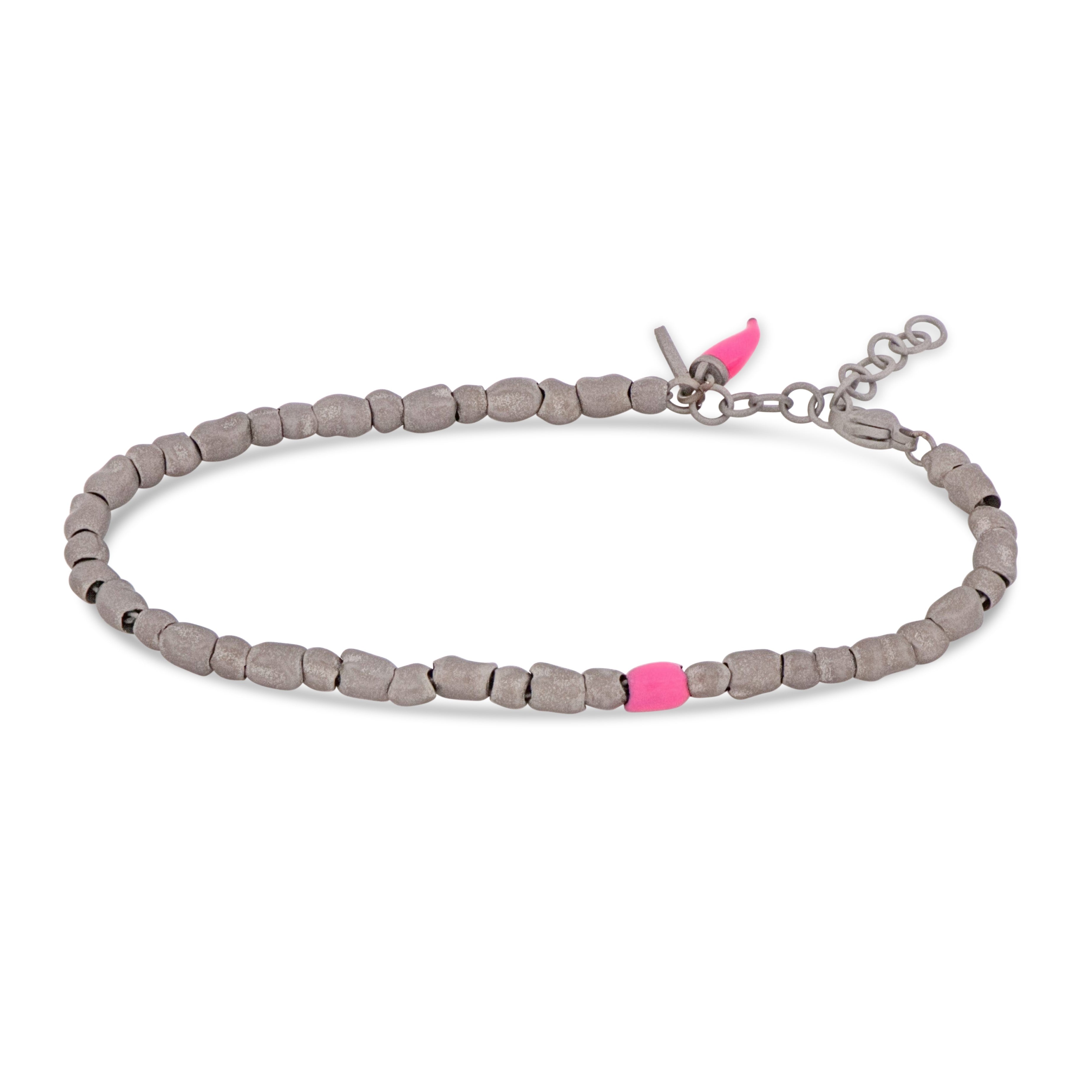 BRACCIALE UOMO CON SASSI PICCOLI IN TITANIO, SMALTO FUCSIA E CORNETTO