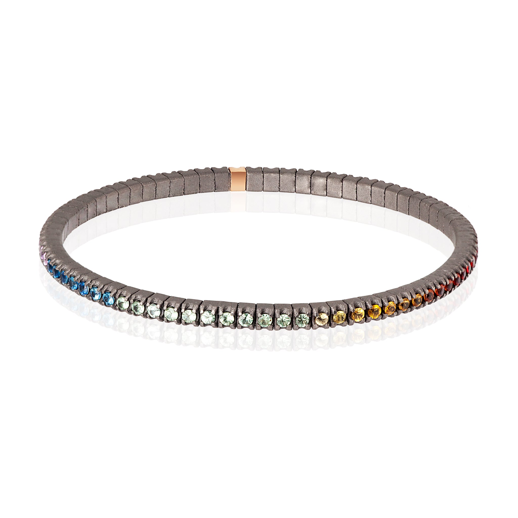 BRACELET TENNIS LIGNE ÉLASTIQUE EN TITANE, OR ROUGE 18 KT ET SAPHIRS MULTICOLORES DE 3 POINTS.