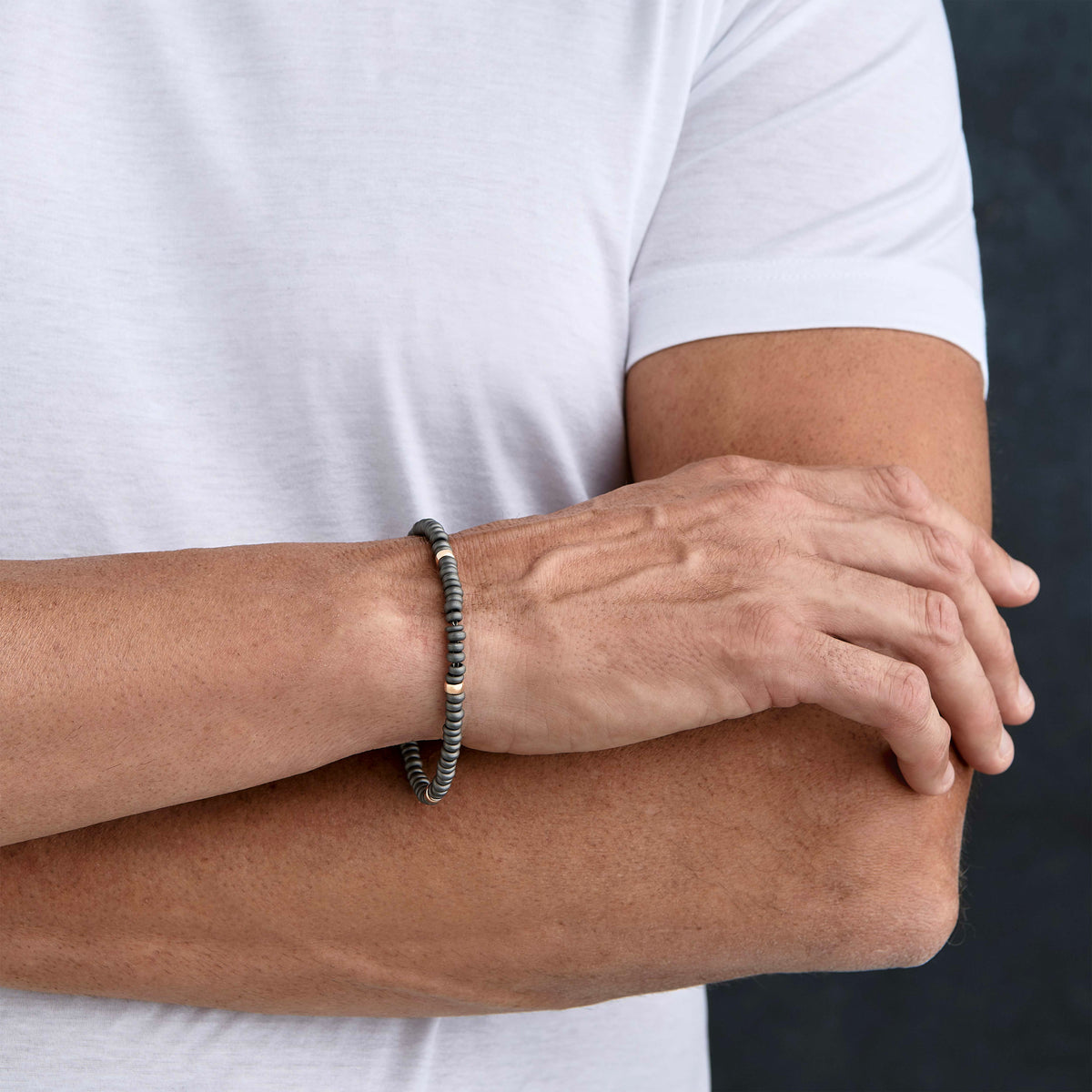 BRACCIALE UOMO CON ANELLINI IN TITANIO E ORO ROSSO 9 KT