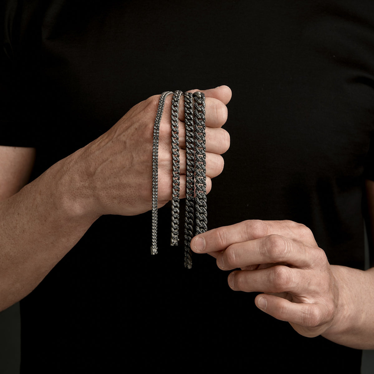 BRACCIALE GROUMETTE IN TITANIO, DIAMANTI BLACK E ORO ROSSO 18 KT