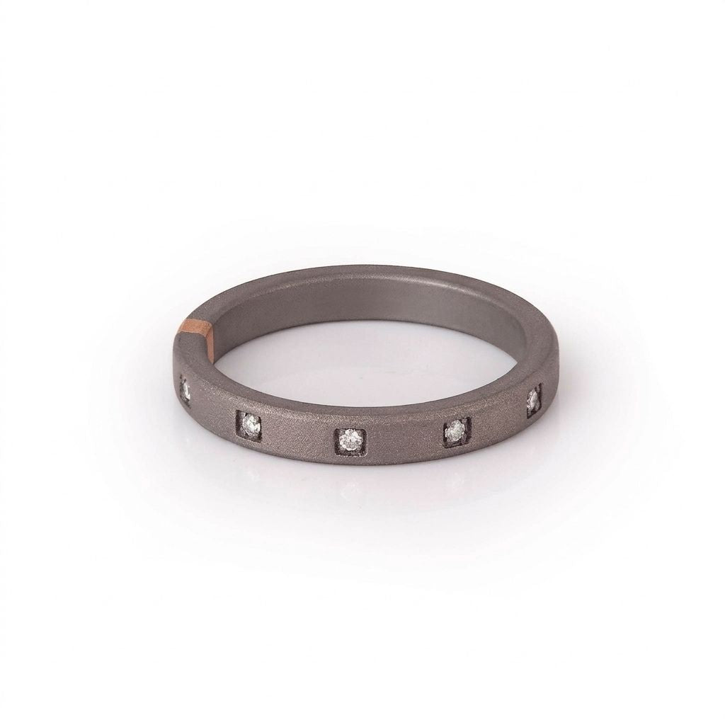 VERETTA IN TITANIO, ORO 18 KT E 10 DIAMANTI WHITE.