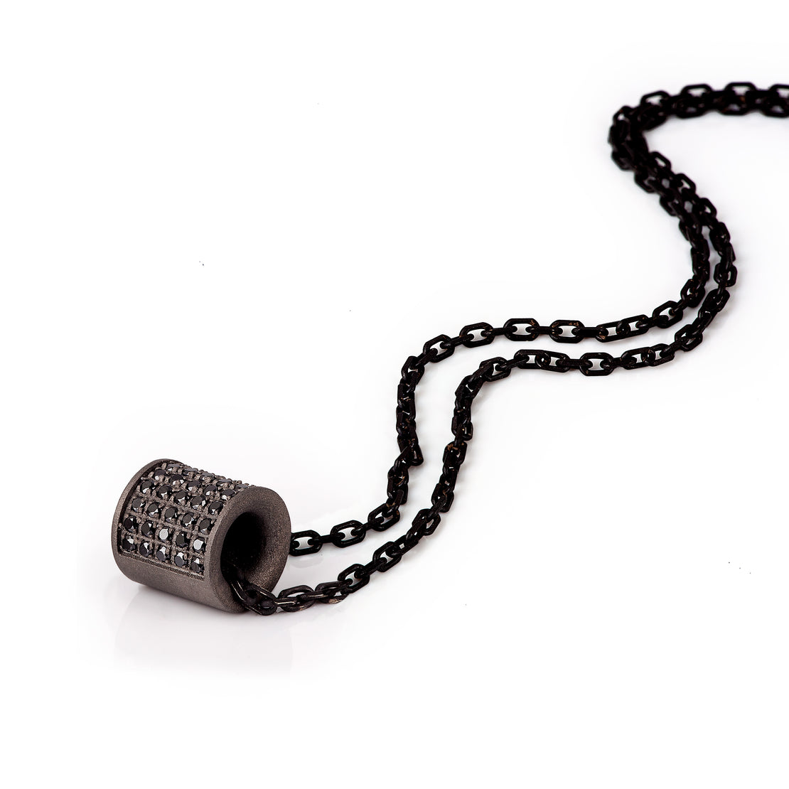 BARILLET EN TITANE, 45 DIAMANTS NOIRS, OR ROUGE 9 KT.