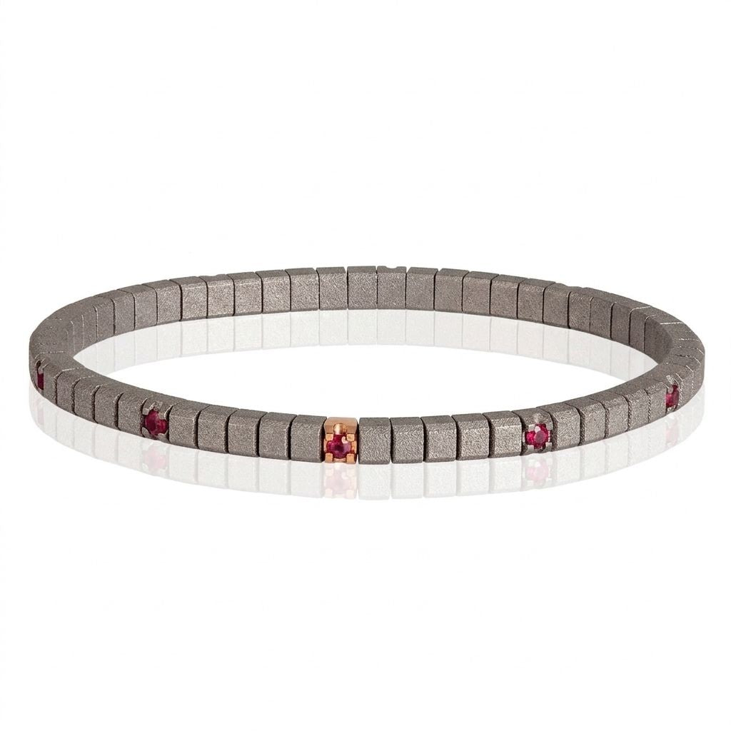 BRACCIALE TENNIS LINEA ELASTICA IN TITANIO, ORO ROSSO 18 KT E 10 RUBINI DA 5 PUNTI