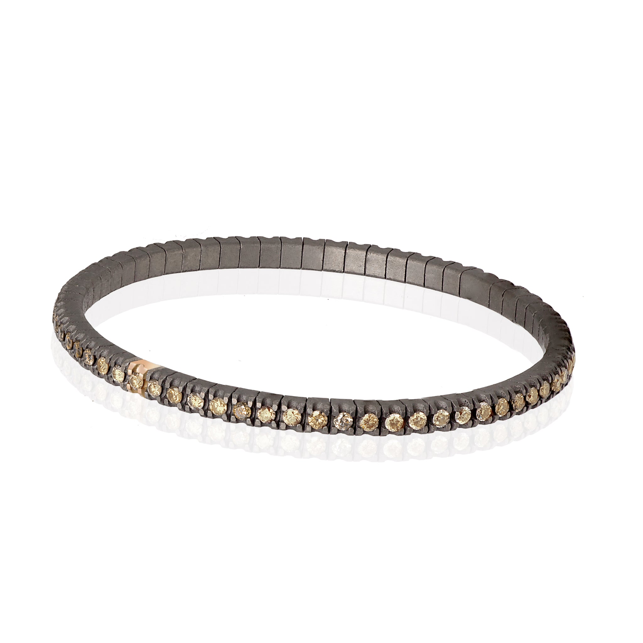 BRACCIALE TENNIS LINEA ELASTICA IN TITANIO, ORO ROSSO 18 KT E DIAMANTI BROWN DA 3 PUNTI.