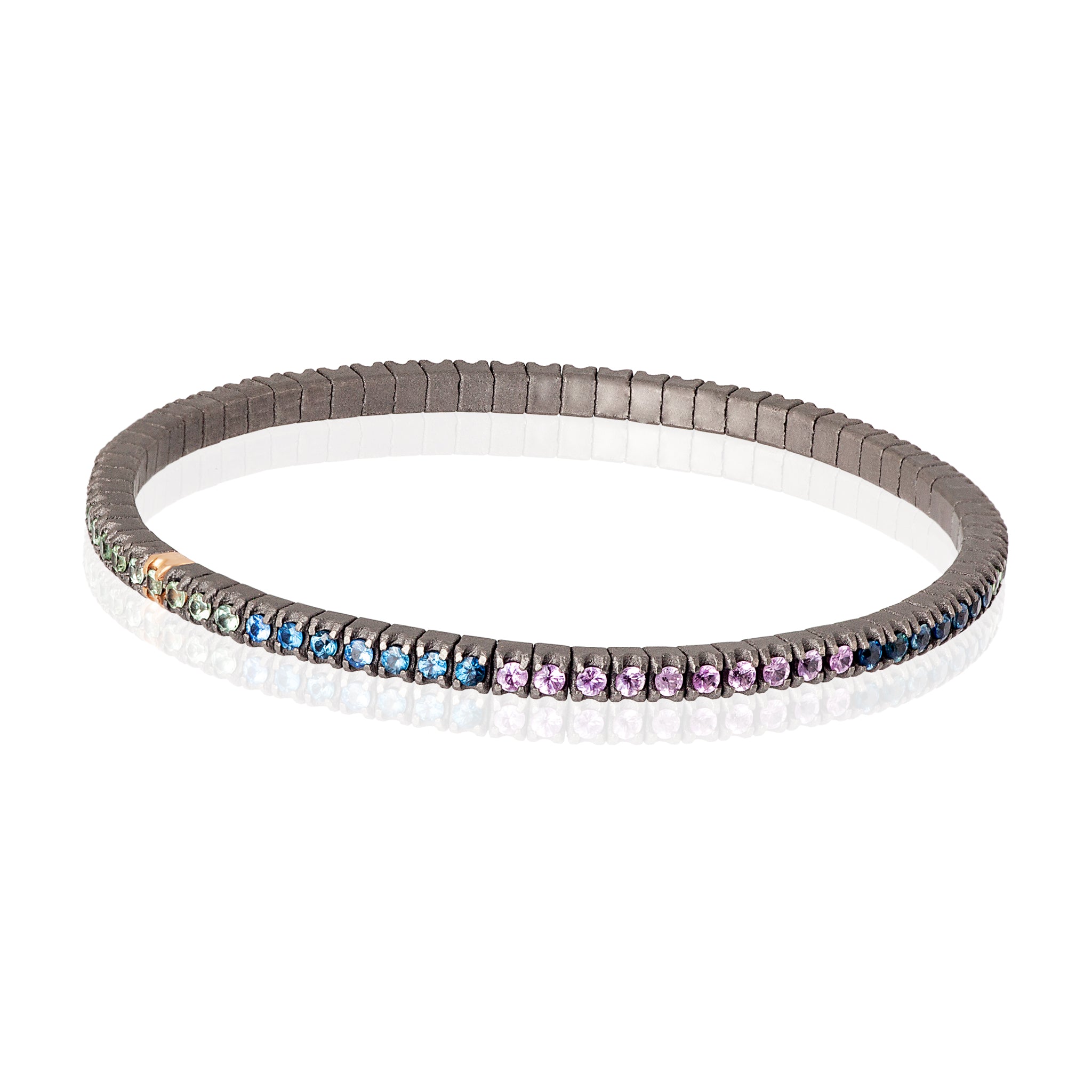 BRACCIALE TENNIS LINEA ELASTICA IN TITANIO, ORO ROSSO 18 KT E ZAFFIRI MULTICOLOR DA 3 PUNTI.