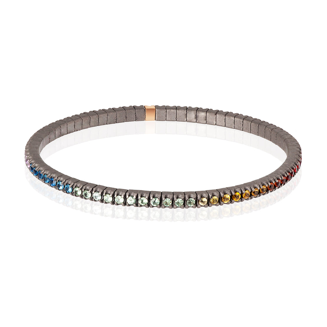 BRACELET TENNIS LIGNE ÉLASTIQUE EN TITANE, OR ROUGE 18 KT ET SAPHIRS MULTICOLORES DE 3 POINTS.